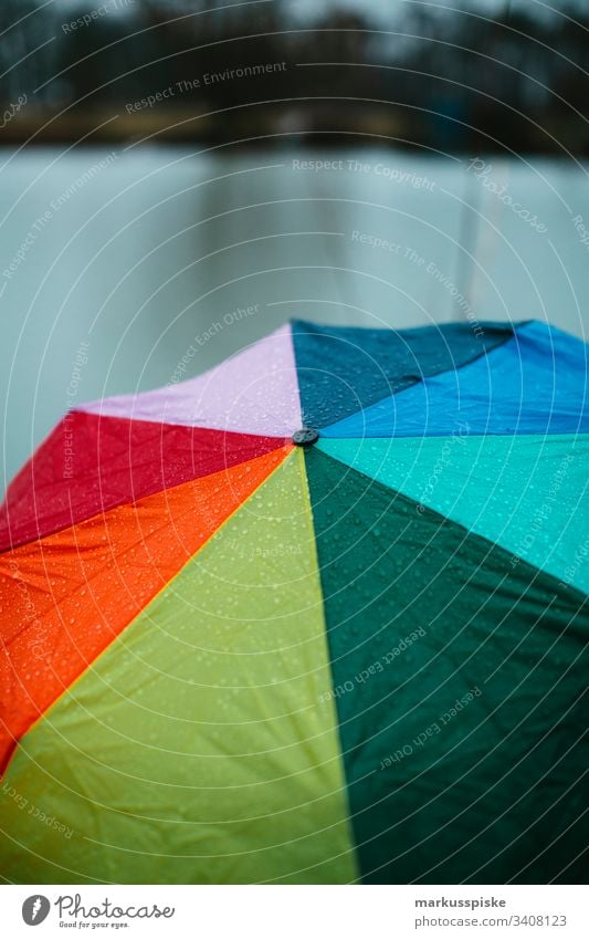 Colourful umbrella Rain Rainy weather Foul weather raindrops variegated Prismatic colors Wet