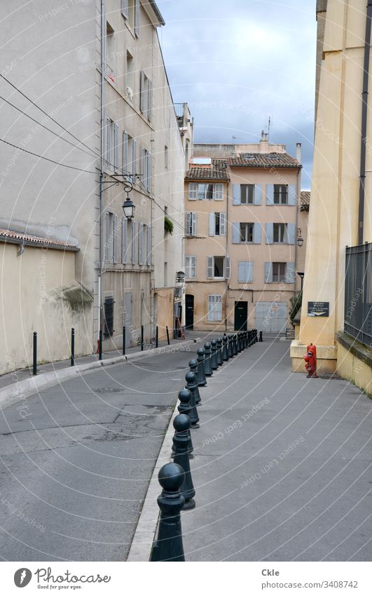 Lonely street in French city Street rue Fire hydrant Housefront houses Old town Exterior shot House (Residential Structure) Colour photo Town Architecture Alley