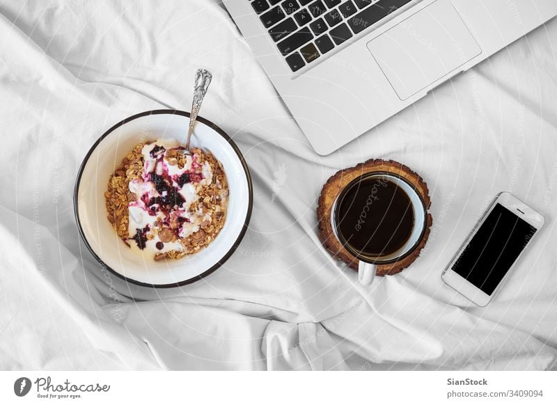 Breakfast in bed top view breakfast coffee cup white tray hot food background drink sugar sweet warm tea cream mood home closeup cozy muesli oats yoghurt