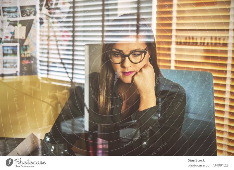 Architect woman working on laptop for new architectural project. business happy workplace computer hands office keyboard desk table technology notebook up