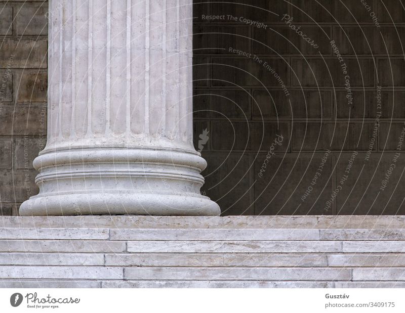 White stone columns with pedestal stairs. background roman history white cylinder style architectural detail ancient old neoclassical legal architecture