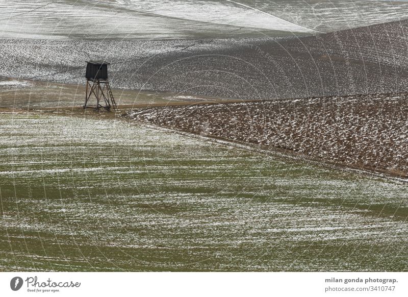 Rural landscape of Turiec region in northern Slovakia. countryside rural fields hunting lookout winter snow nature