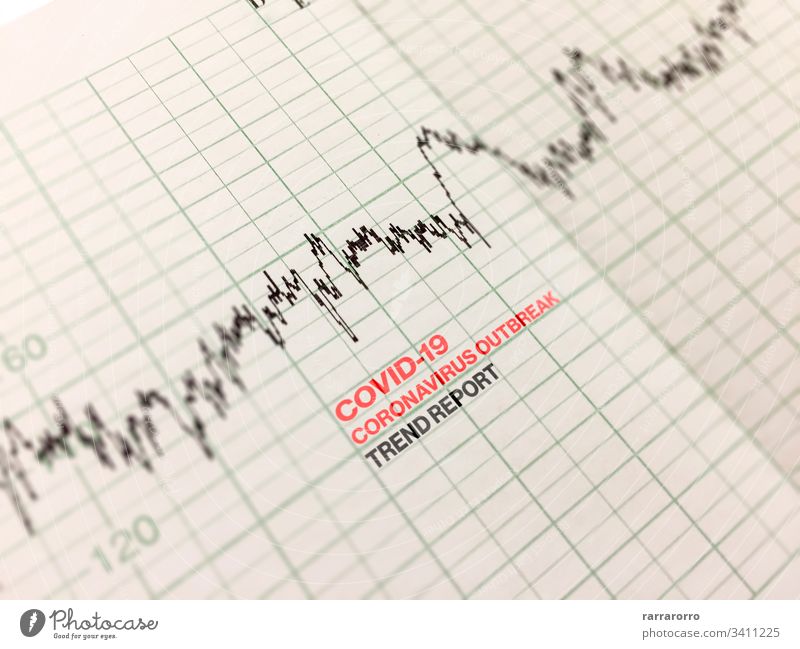 a diagram printed on a printout indicating the trend of the Covid-19 virus outbreak. covid-19 coronavirus epidemic spread alert emergency medicine pandemic