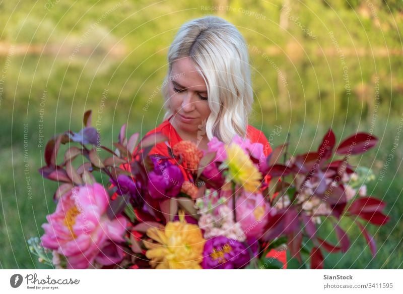 Beautiful blonde florist woman hold wonderful bouquet Happy Hand Wedding Dress Retro Style Adults Bouquet Modern Cute Woman Brunette Soft Blue Pink Hold