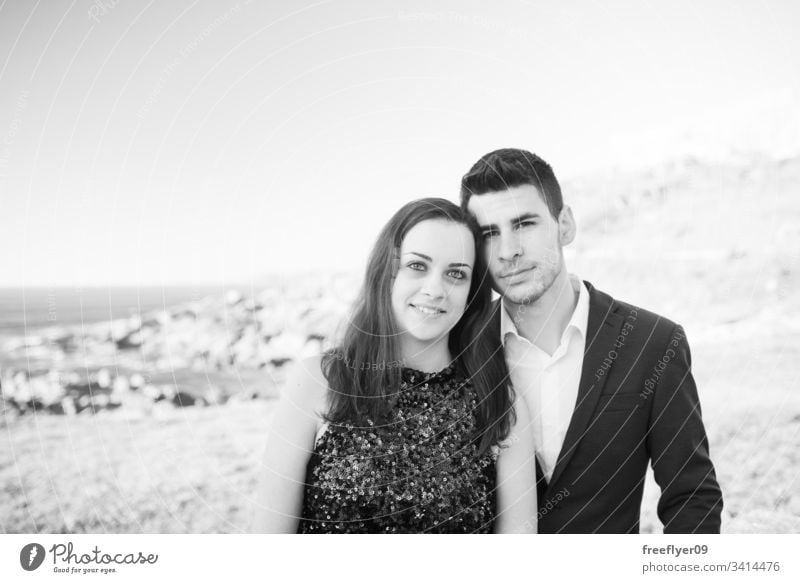 Portrait of a young couple enjoying time together near the sea love wedding nature ocean baiona vigo galicia plants romantic sunset horizon landscape seascape