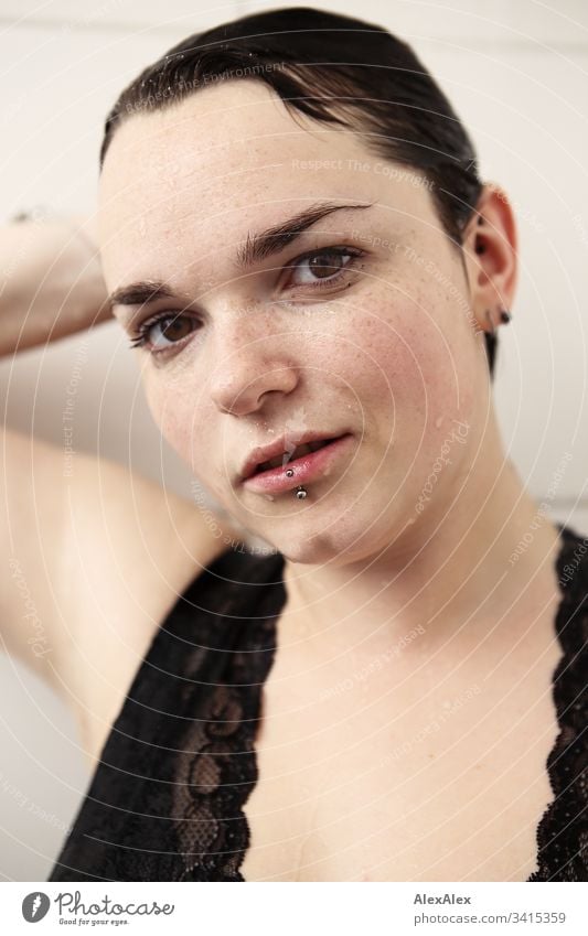 Portrait of a young woman in the shower lingerie Underwear Point Low neckline Femininity Copy Space right Copy Space left Forward Portrait photograph