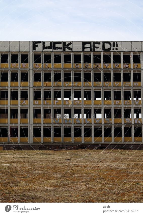 Ruin of a high-rise building in berlin with lettering Fuck AFD, graffiti Berlin AfD Politics and state Reichstag Germany Deserted Capital city Extreme