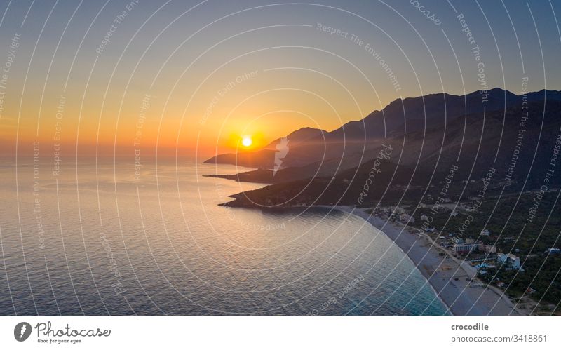 Aerial view coast Albania Ocean Water Sunset Vacation & Travel Summer Coast Beautiful Rock clear water Adriatic Sea UAV view Aerial photograph bathe road trip