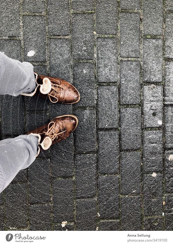 On the way in the rain - part of the legs and shoes In transit Lanes & trails Going Street To go for a walk Asphalt Shadow Exterior shot Colour photo