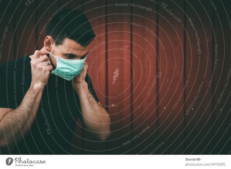 Coronavirus man with breathing mask coronavirus Respirator mask epedemia worst case Mask Mouth Quarantine karantäne Precuation Fear point interdiction Virus