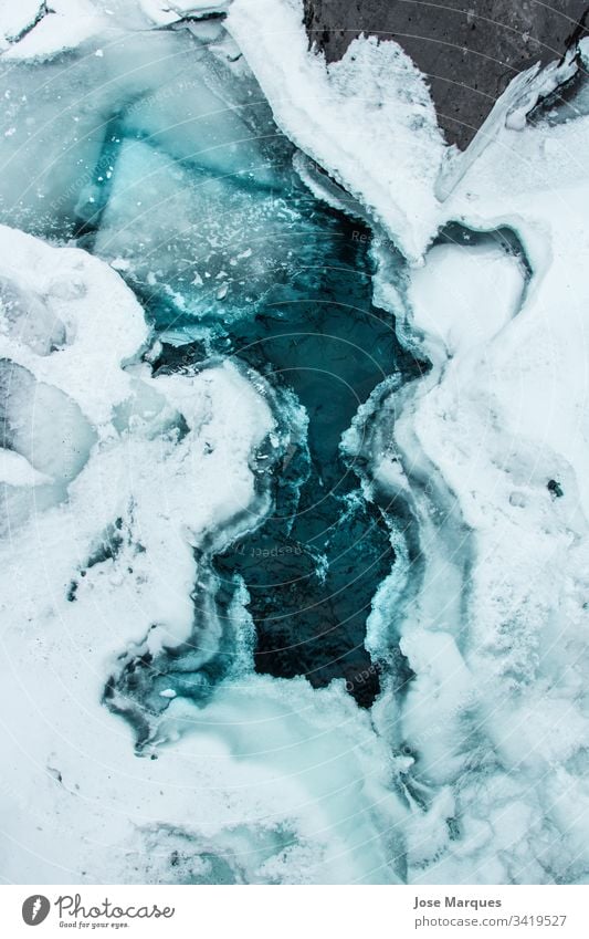 frozen lake in the snow landscape mountain winter iceland cold background travel tourism vikings nature wather river Frost Exterior shot