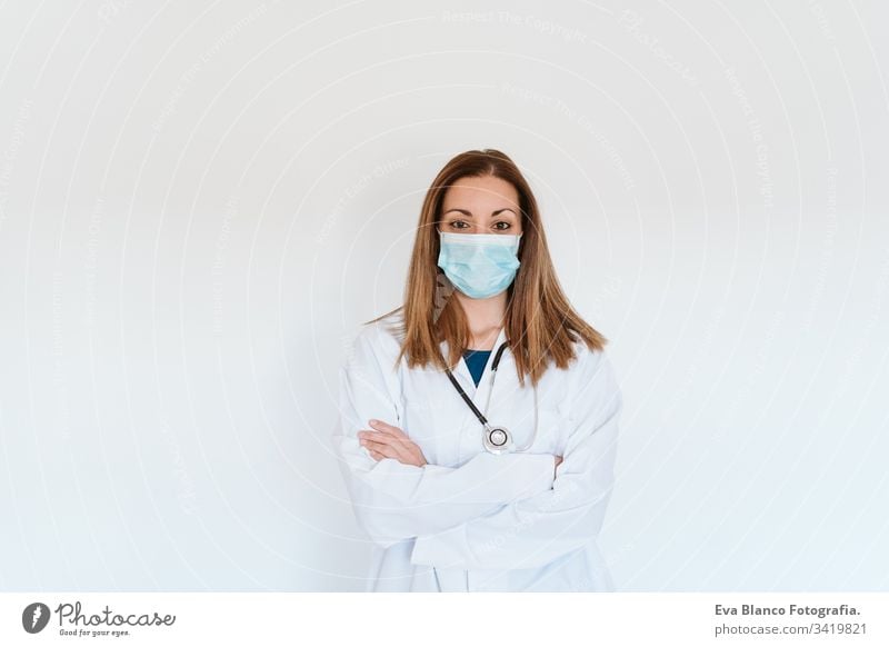 portrait of doctor woman wearing protective mask and gloves indoors. Corona virus concept professional corona virus hospital working infection safety epidemic