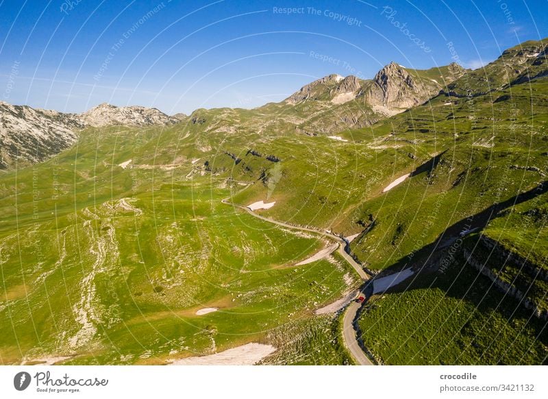 Durmitor Nationlapark Roadtrip Street road trip bulli VW T6 vw bus Montenegro durmitor Meadow Mountain UAV view Aerial photograph hilly Travel photography