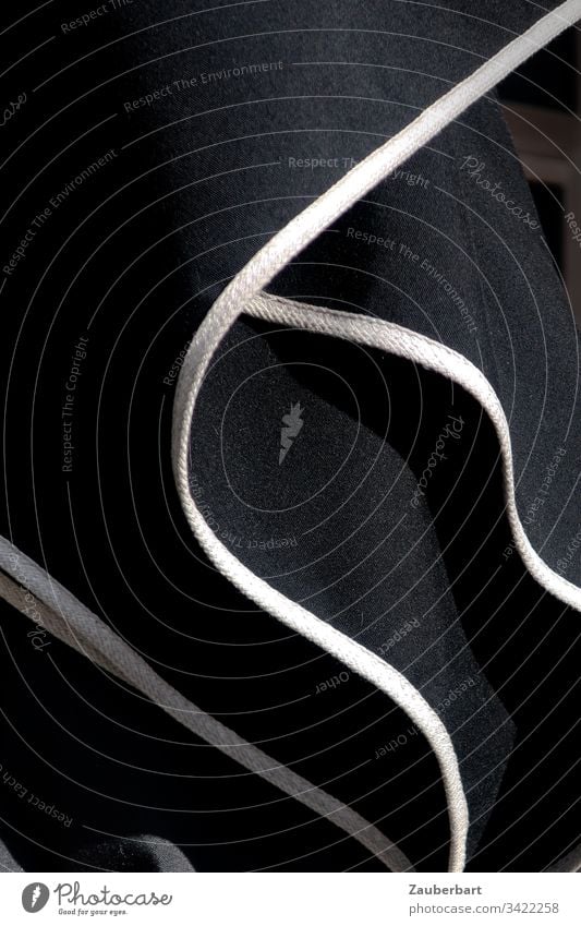 Black parasol with white stripes, folded, close-up Sunshade Stripe White crease Close-up Structures and shapes Line Abstract Deserted