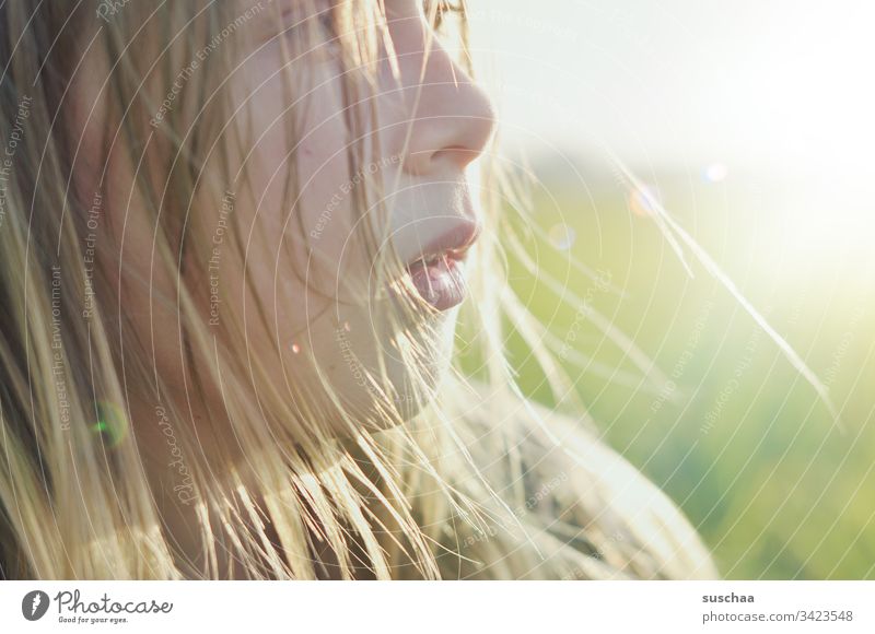 portrait of a girl in backlight Child Girl hair Face Profile Nose Mouth Back-light Sunlight straggly hair instant Bright rays Infancy Hair and hairstyles