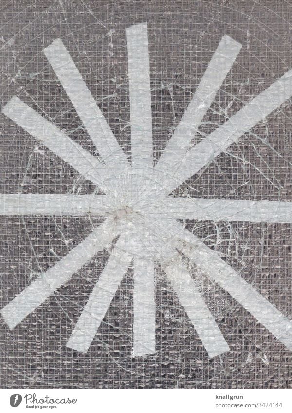 Hole in a wire glass pane taped with white adhesive tape in a star shape Hollow Slice Broken Adhesive tape Stars Wire glass door Pattern Structures and shapes