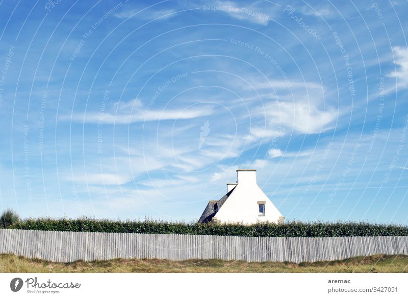 House in Brittany in France House (Residential Structure) Characteristic Manmade structures Fence Architecture Hedge Sky Blue White pediment