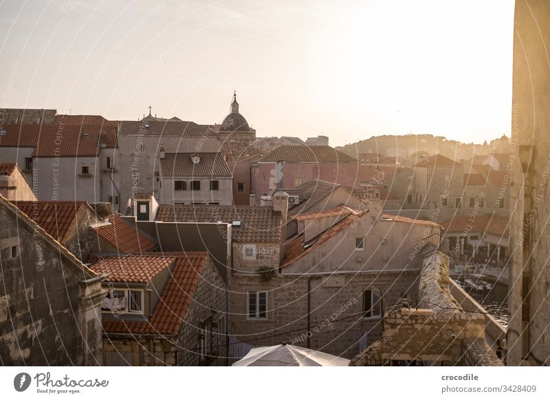 Dubrovnik Old Town Croatia Tourism Old town Wall (barrier) Fortress Ocean Coast World heritage houses Historic Buildings sunset Back-light Mediterranean