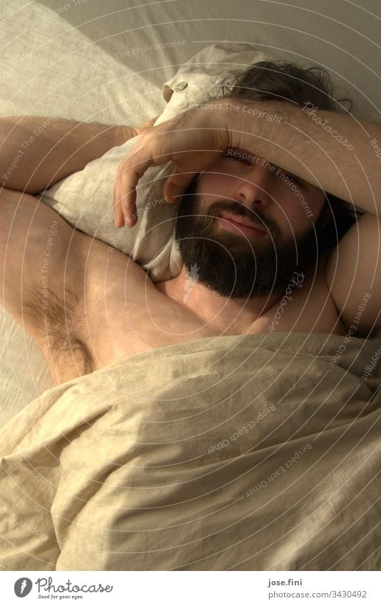 The Beardbearer Young man Lips Facial hair schnauzer Masculine Man Morning Lie Sunlight warm Bed sleep late University & College student Beard growth