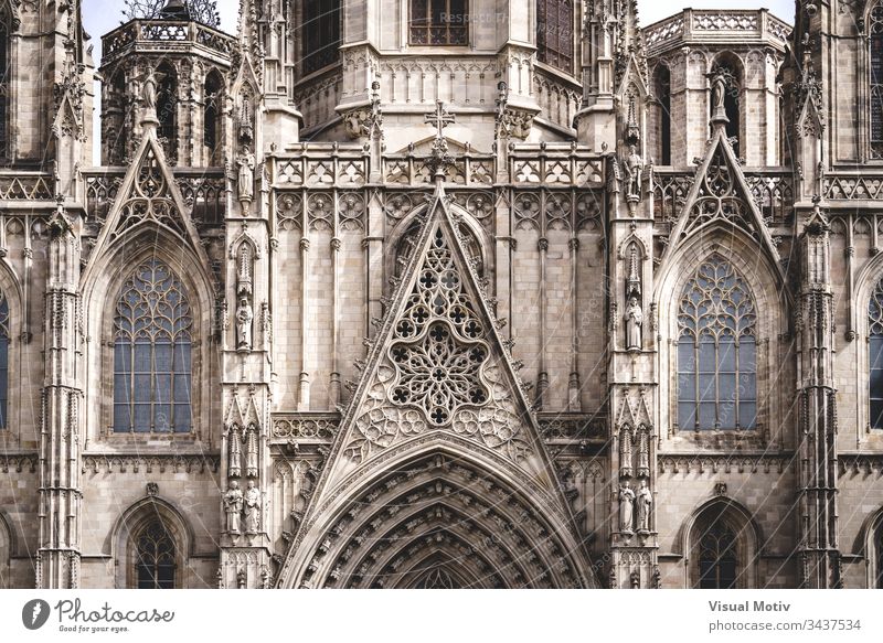 Rose window and sculpted filigrees at the front of a gothic cathedral Cathedral basilica architecture architectural built structure building history religion