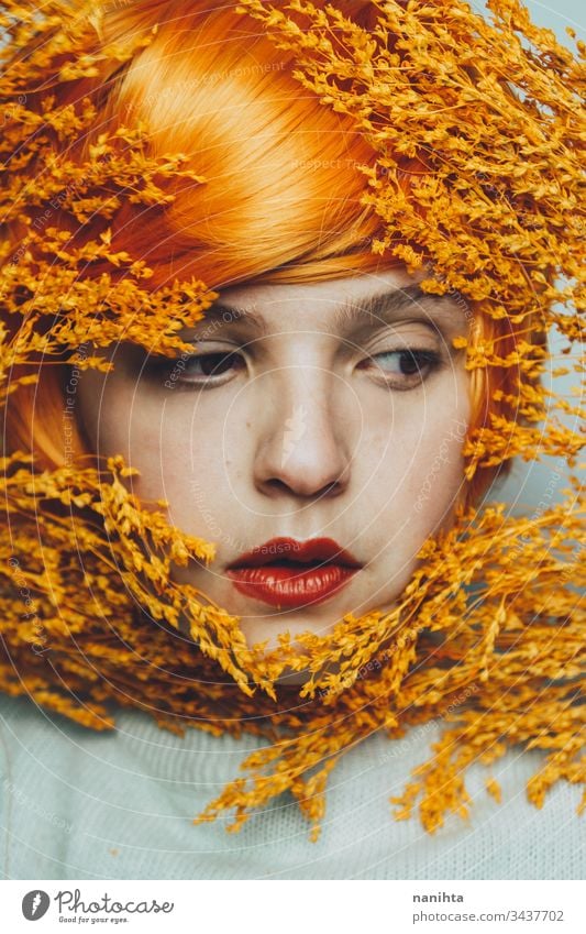 Moody portrait in orange tones of a white woman close up redhead redhair art artistic mood moody studio expression expressive beauty beauty photography