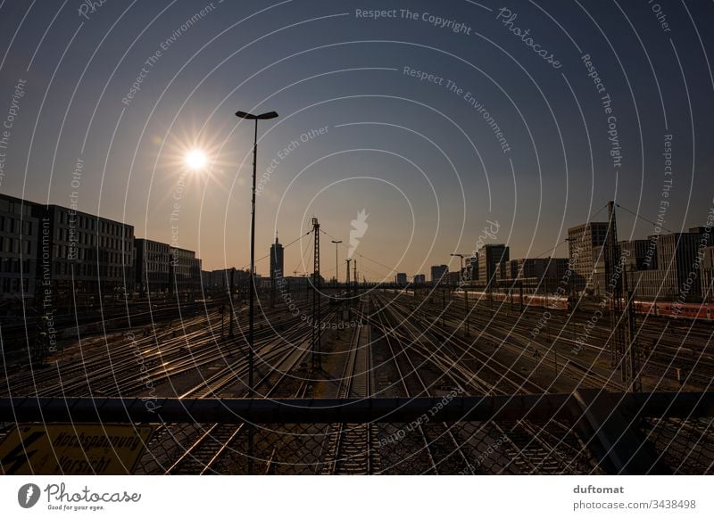 Munich, Hackerbrücke, train railway tracks at sunset Town Architecture urban geometric Exterior shot Abstract Modern City Railroad tracks Pattern