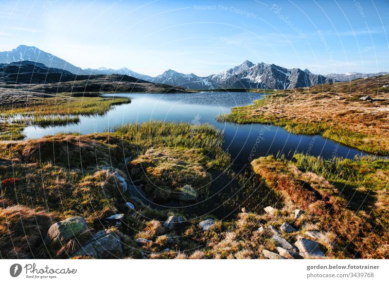 Mountain World Romanticism daylight Colour Landscape format little colour Sky mountains panoramic shot Nature Exterior shot Blue Natural Deserted