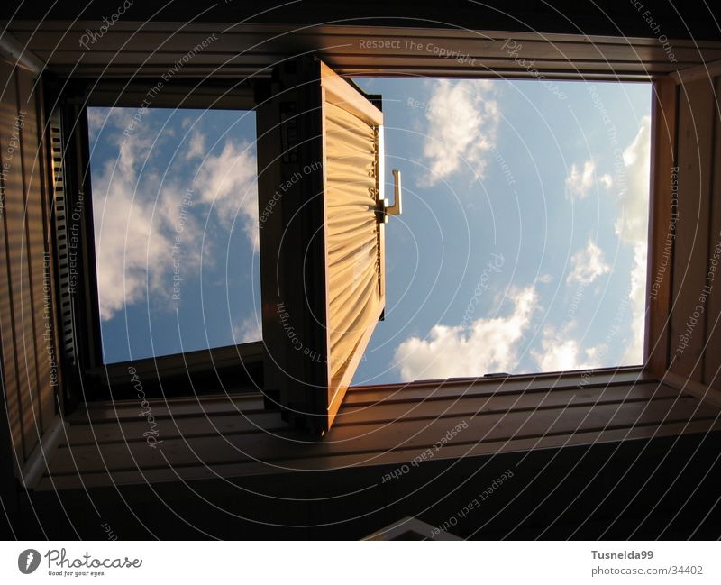 The Two Faces of Heaven Clouds Skylight Window Blue Exterior shot