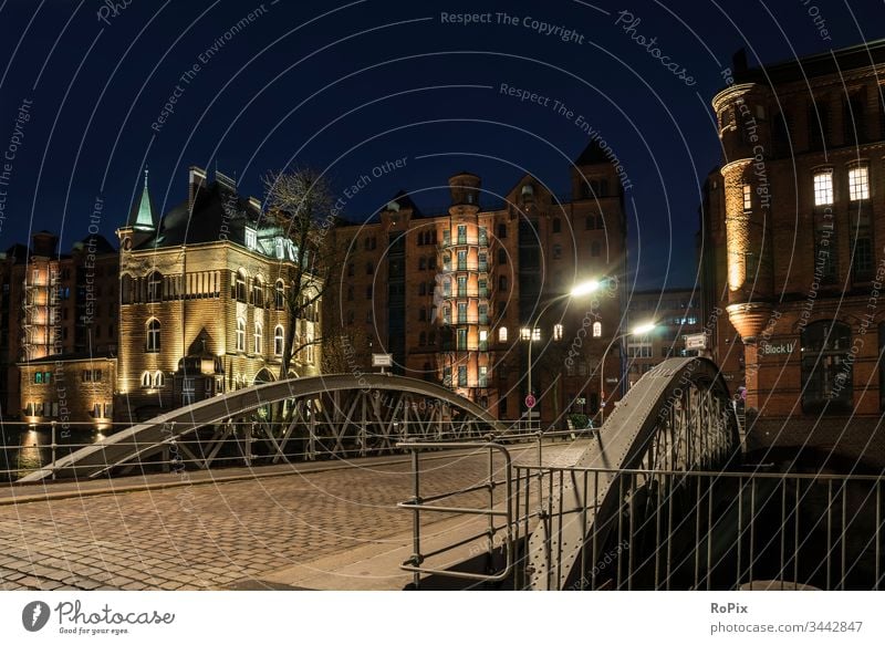 Night in Hamburg's warehouse district. storehouse city Harbour Depot Channel urban Elbe Bridge Building Architecture River Light Low tide canal locks Trade