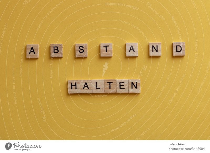 Scrabble letters "Keep your distance keep sb./sth. apart gap stop Healthy pandemic Risk of infection Illness COVID Quarantine Corona virus Virus Epidemic