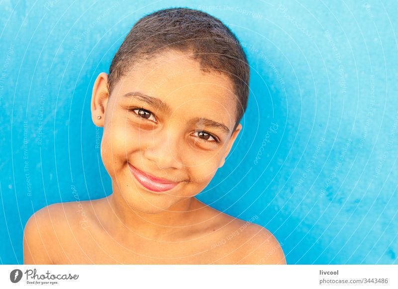 smiling girl on the streets of havana, cuba habanna caribean island cuban woman people portrait real people lifestyle smile kid children childhood human