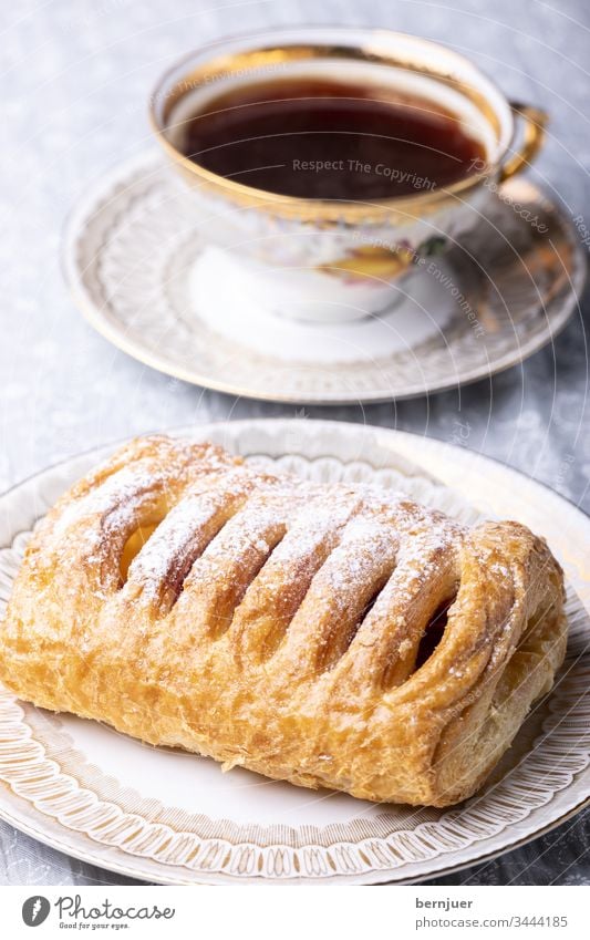 Cherry pastry with icing sugar Cherry biscuits Cherry bag Coffee cup Cup golden Confectioner`s sugar Sugar dough berry Powder Candy Herbe cherries Crust Juicy