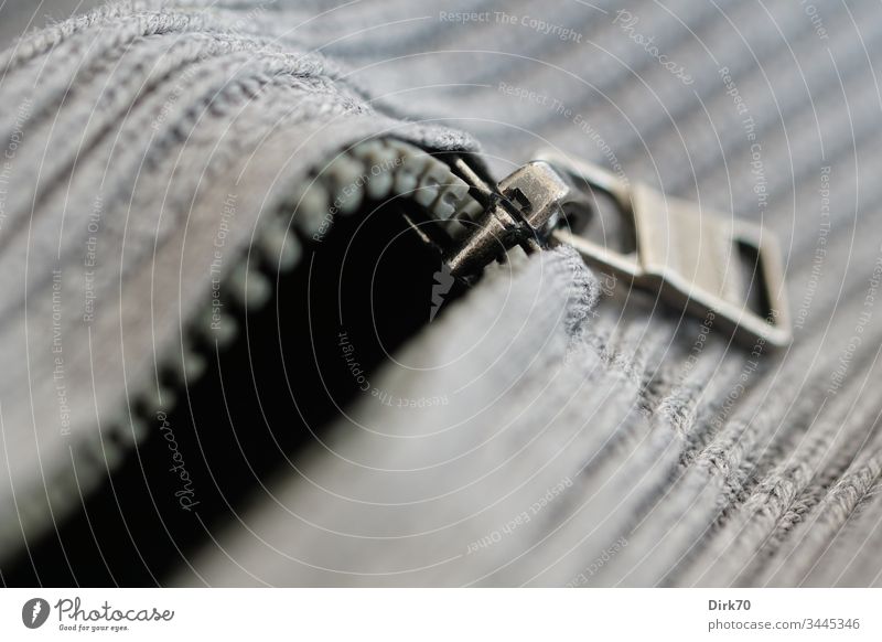 Macro shot of a zipper on a grey pullover Zipper Sweater Knitted knitwear Troyer Clothing garments Macro (Extreme close-up) shallow depth of field