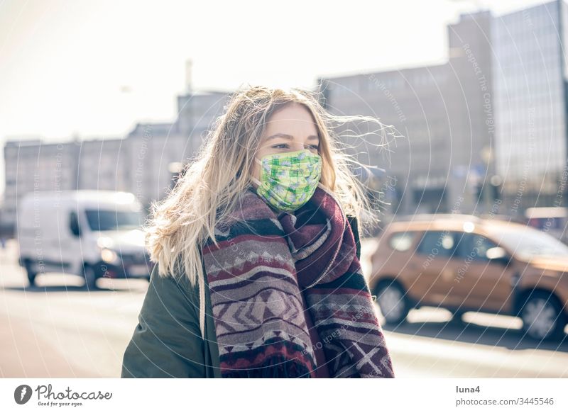 young woman with mouth guard in the city Woman Mask Respirator mask Face mask Town Young woman Virus coronavirus anxious viruses pandemic Infection Threat flu