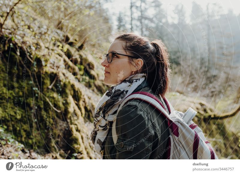 Young woman goes hiking in the forest Wellness Expedition Day Far-off places Camping Harmonious Going Shadow on one's own Well-being Target path Contentment