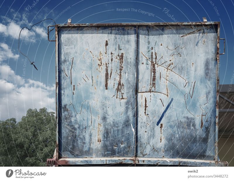 flap Metal Flap Old Blue Rust Tracks Abrasion Ravages of time scratched Scratch marks Open Scrap metal Container scrap metal Shallow depth of field Sharp-edged