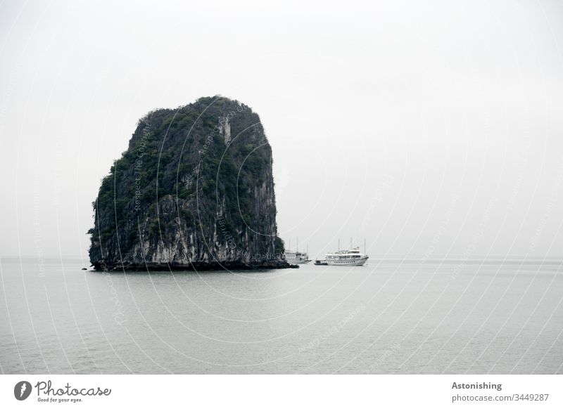 big rock in the Ha Long bay, Vietnam Halong Ha-Long Rock Stone Vacation & Travel Exterior shot Asia Halong bay Bay Nature Ocean Landscape Water Mountain