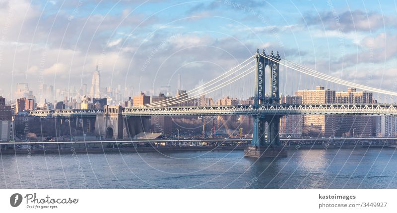 View of Williamsburg Bridge in New York City williamsburg bridge new york architecture city manhattan river sky usa water building cityscape reflection skyline