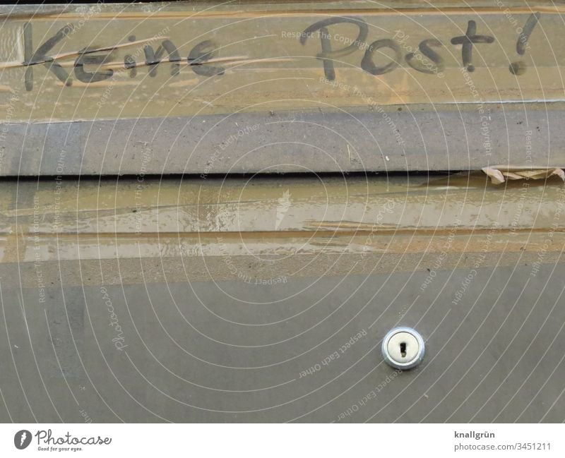 Close-up of a house mailbox with the note "no mail" written with black felt-tip pen on brown parcel tape Mailbox Communicate Signage Word Letters (alphabet)