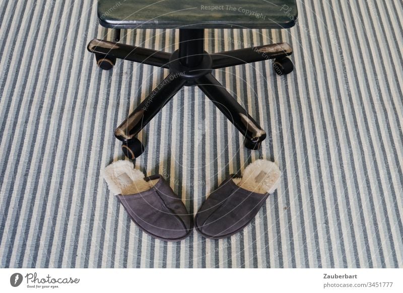 Desk chair on striped carpet is happy about the home office, in front of it slippers Slippers Carpet Stripe Green Interior shot Detail Colour photo Deserted