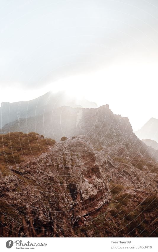 volcanic rock mountains in Tenerife, Canary Islands, Spain abstract background backgrounds big black blue canary cloud colorful empty environment eruption