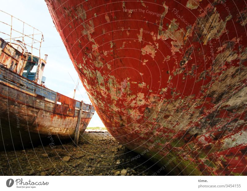 no more traffic at all Wreck Beach Large Red two ships wreck stones Broken Trashy Rust Cemetery ship graveyard wooden planks boat wall Maritime