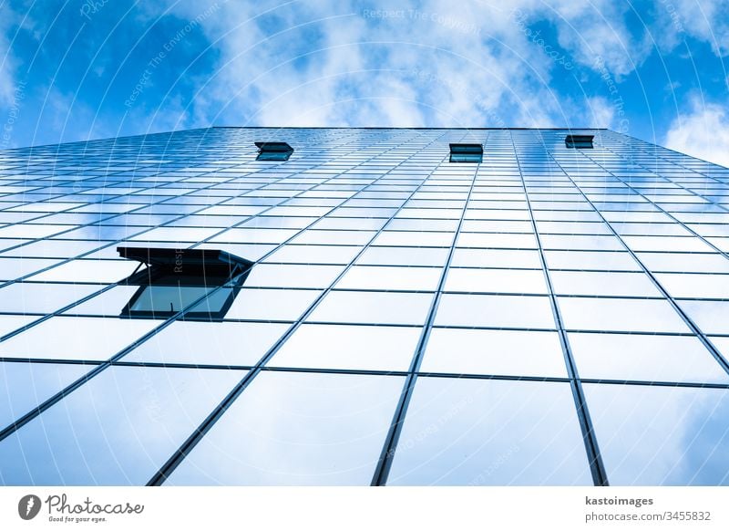 Modern facade of glass and steel. background sky cloud skyscraper abstract economy architecture real estate blue commercial office construction exterior city