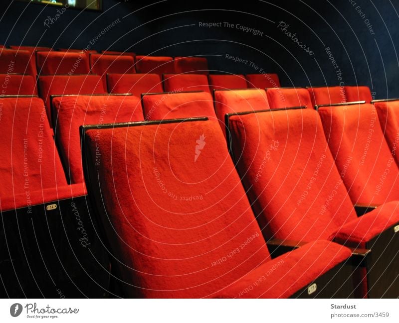 Cinema is the greatest! Leisure and hobbies Armchair Film industry Video Sit Red Movie theater seat Movie hall Colour photo Interior shot Deserted