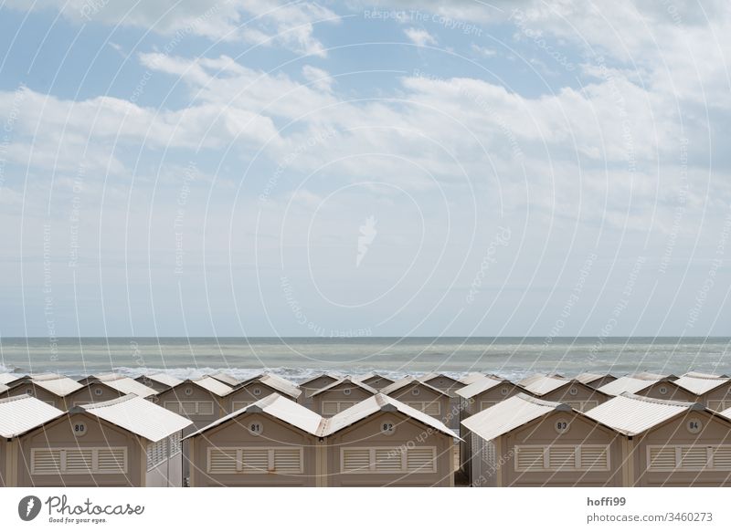 Beach houses by the sea Beach hut cabin monotony Row Ocean Horizon Built-in Vantage point limited view Narrow Vacation & Travel Coast Sand Summer Sky