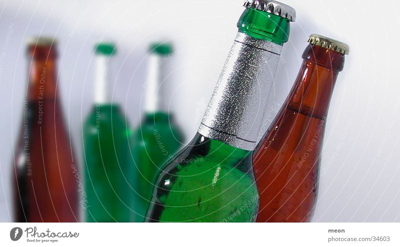 beer bottle Bottle of beer Beer Alcoholic drinks pool Shallow depth of field Deserted 5 Green Brown Stained glass Detail Full Closed Colour photo