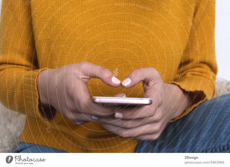 close up of woman texting on smartphone at home technology contraption conversation communicating message closeup concept cyberspace learning businesswoman