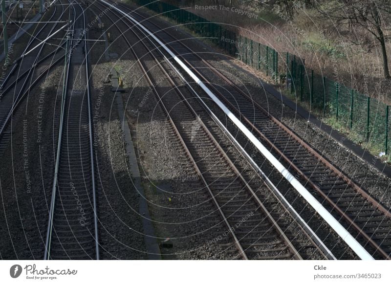 Railway tracks in light and shadow railway line Traffic route Intercity Vacation & Travel Transport Railroad Train travel Rail transport Railroad tracks