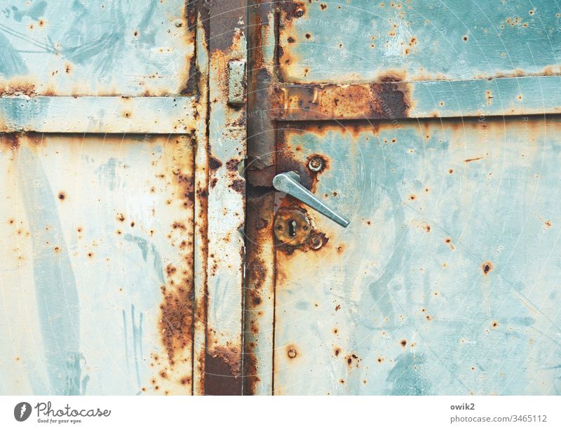 Hanging handle Goal Old door handle Metal Rust Trashy Decline Tracks Ravages of time Colour Turquoise Blue russet Detail Deserted Transience Destruction