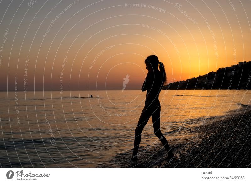 Girls at sunset on the beach Beach Ocean Sunset Silhouette bathe cheerful fortunate Rock Joy Stand Tourism Croatia Mediterranean sea Coast vacation free time